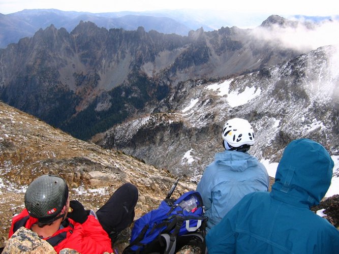 Here's part of the group on Cardinal, looking east toward the steep slopes of Cloudcomb Peak.
The clouds closed in a moment later, so I never got a picture of the whole group.